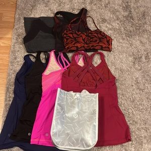 7 Lululemon Athleta Zobha workout tops and sports bras. Great condition free bag